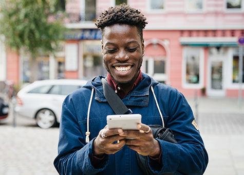 A customer explores digital tools on his phone.